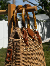 Bamboo Handle Woven Tote showcasing stylish bamboo handles and woven texture, perfect for beach outings.